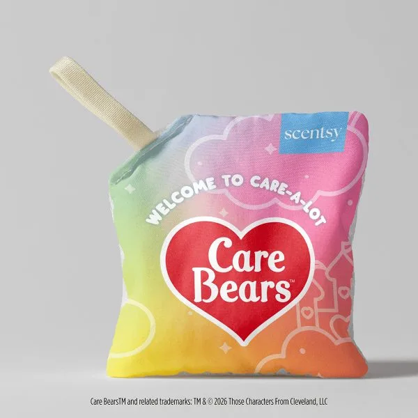 Care Bears: Welcome to Care-A-Lot Scent Pak - Colourful rainbow gradient fabric Scent Pak with a red heart-shaped Care Bears logo and "Welcome to Care-A-Lot" text, featuring a cream-coloured hanging loop