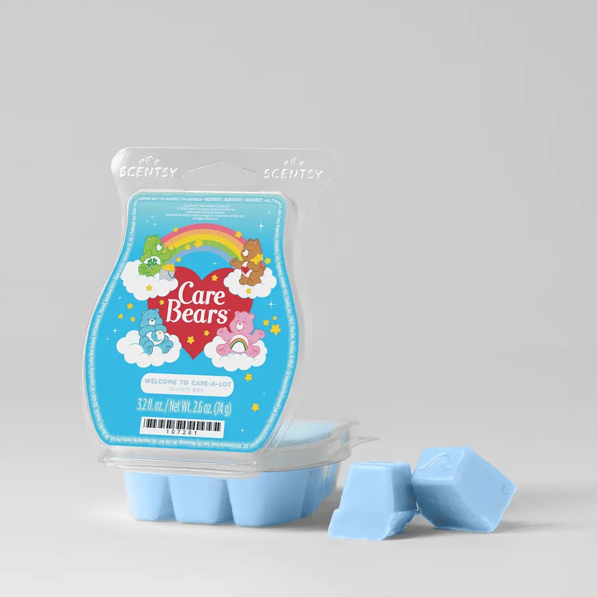 Light blue Scentsy wax bar mould with Care Bears illustration featuring rainbow, clouds and characters, Care Bears: Welcome to Care-A-Lot Scentsy Bar, with two individual wax pieces displayed in front