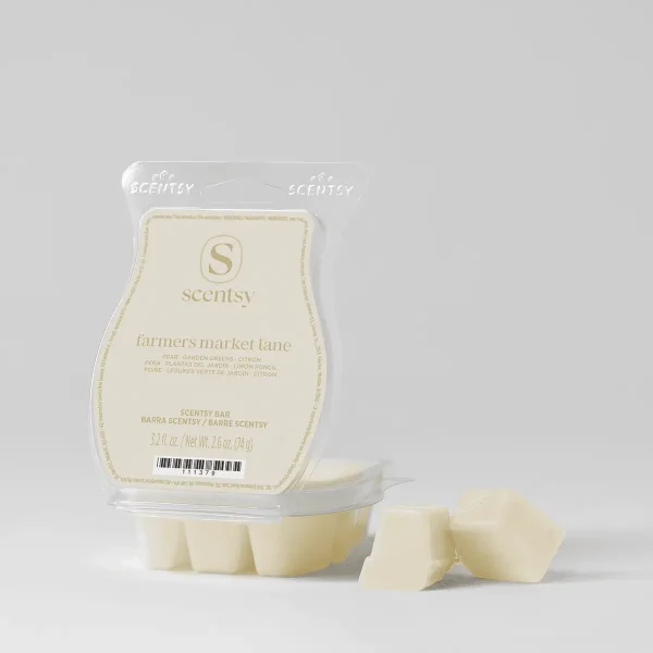 Pale cream-coloured Scentsy wax bar in clamshell packaging, the Farmer’s Market Lane Scentsy Bar, with six individual cubes and two removed cubes displayed beside the pack