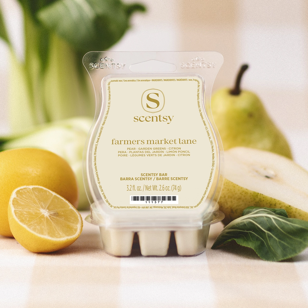 Cream-coloured Scentsy wax bar in a clamshell case surrounded by lemons, pears, and green leaves, the Farmer's Market Lane Scentsy Bar