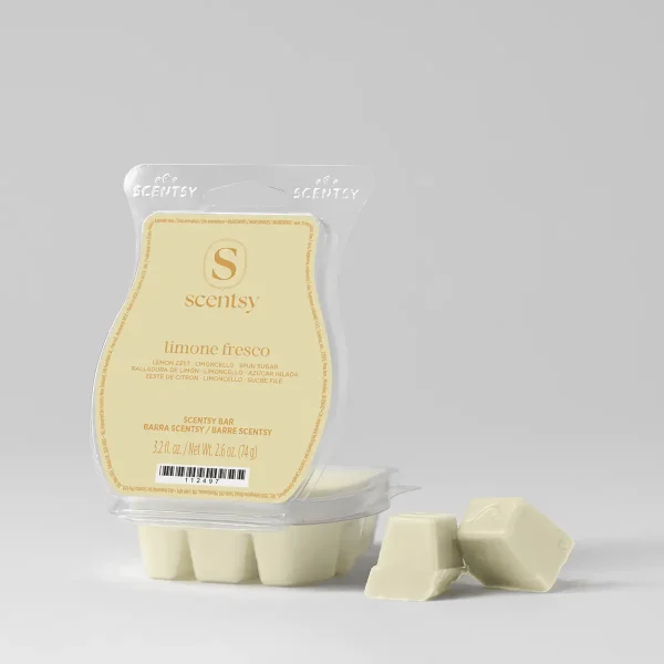 Limone Fresco Scentsy Bar - Pale yellow wax bar in a clear clamshell with gold-embossed Scentsy branding and Limone Fresco scent details, shown with individual wax cubes beside the packaging