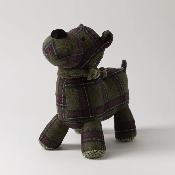 Soft plush Scottie dog with a green and burgundy tartan pattern, black ears and nose, wearing a matching tartan belly band, Sutton the Scottie Dog Scentsy Buddy