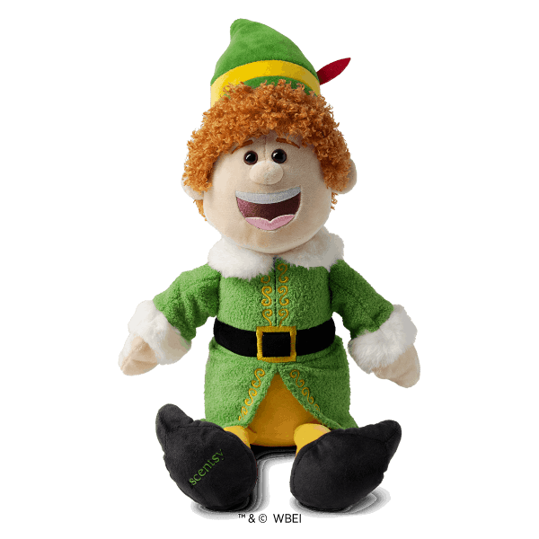 Buddy the Elf Scentsy Buddy plush toy with orange curly hair, green pointed hat with yellow band and red feather, cream face with wide smile, green fleece jacket with gold embroidered details and black belt, white fur cuffs, and black shoes.