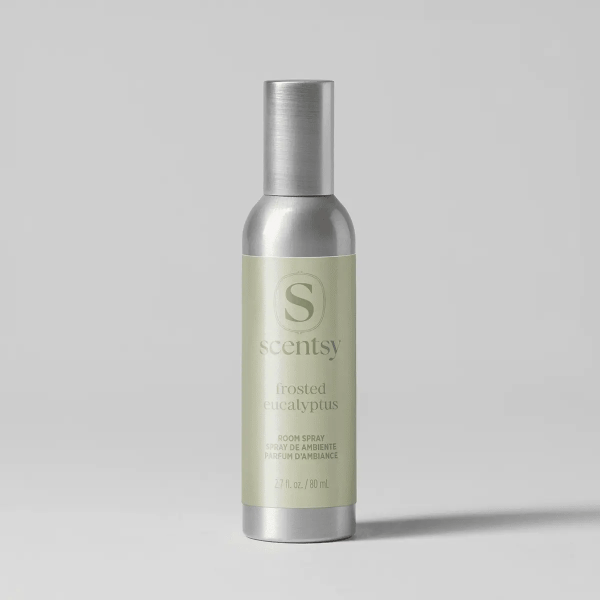 Tall metallic spray bottle with pale green label featuring the Scentsy logo and "Frosted Eucalyptus Room Spray" text, 80 ml size