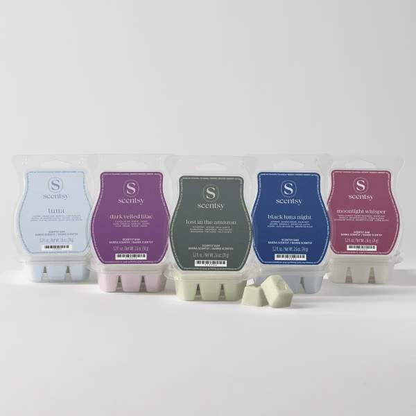 Five Scentsy wax bars in assorted autumn colors: light blue, purple, green, navy, and burgundy, each labeled with scent names including Tuna, Dark Veiled Lilac, Lost in the Amazon, Black Tuna Night, and Moonlight Whisper, shown with individual wax melts displayed in front, part of the Halloween Scentsy Bar 5-pack