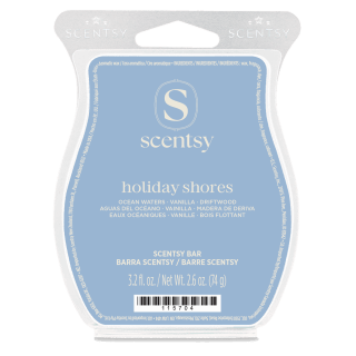 Light blue clamshell packaging with white Scentsy branding and the Holiday Shores Scentsy Bar label featuring ocean waters, vanilla, and driftwood scent notes