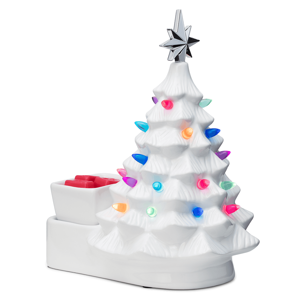 White ceramic Christmas tree warmer with tiered sections and textured ridges, topped with a silver dimensional star, decorated with colourful round and teardrop ornaments, the Merry Little Christmas - White Scentsy Warmer, with a matching white base and red wax visible in the top reservoir