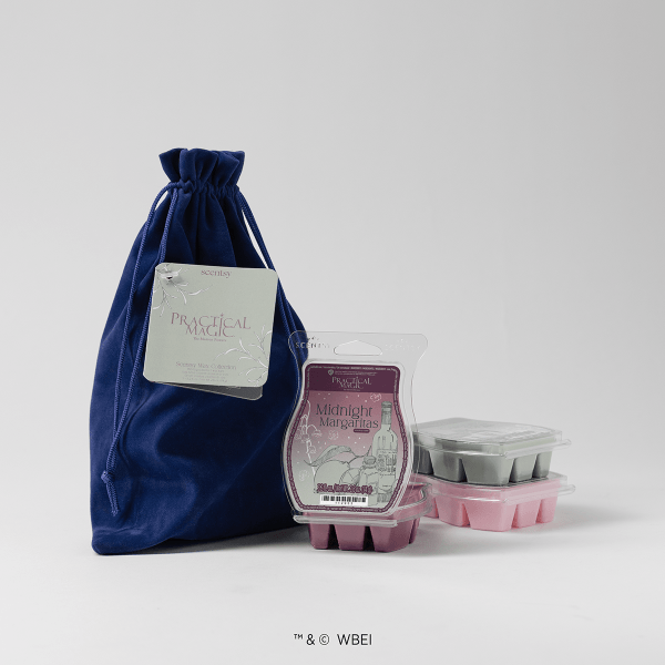 Navy blue velvet drawstring pouch with Scentsy Practical Magic - Scentsy Wax Collection branding, containing pink and grey wax melt bars and a Midnight Margaritas wax melts package
