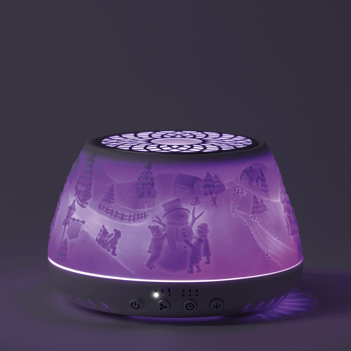 Scentsy Air Quad diffuser in purple with an iced winter village scene, black mesh top, and four control buttons at the base, emitting purple ambient light