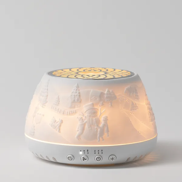 White ceramic diffuser with embossed winter scene featuring trees, figures and decorative elements, illuminated from within with warm golden light, four touch-control buttons on base, the Scentsy Air Quad - Icicle Lan