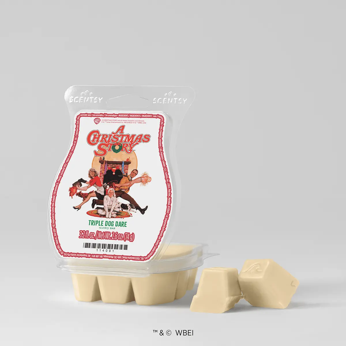 Cream-coloured wax bars in a clear plastic clamshell with a red-bordered label featuring A Christmas Story: Triple Dog Dare Scentsy Bar artwork showing characters and a fireplace scene