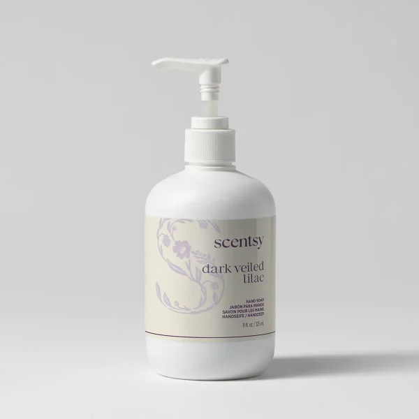 White pump bottle of Dark Veiled Lilac Hand Soap with purple floral illustration and multilingual labelling on cream label band, 11 fl oz size