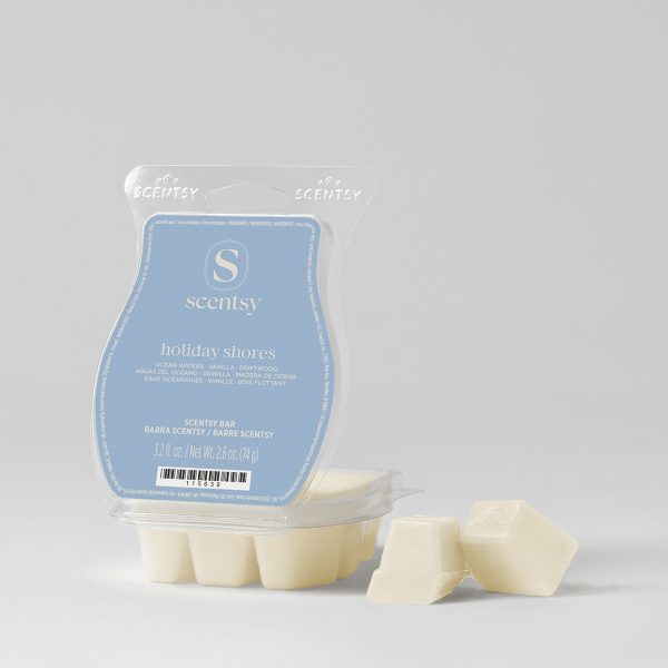 Cream wax cubes beside a clamshell pack with a soft blue label, the Holiday Shores Scentsy Bar, shown on a pale grey background