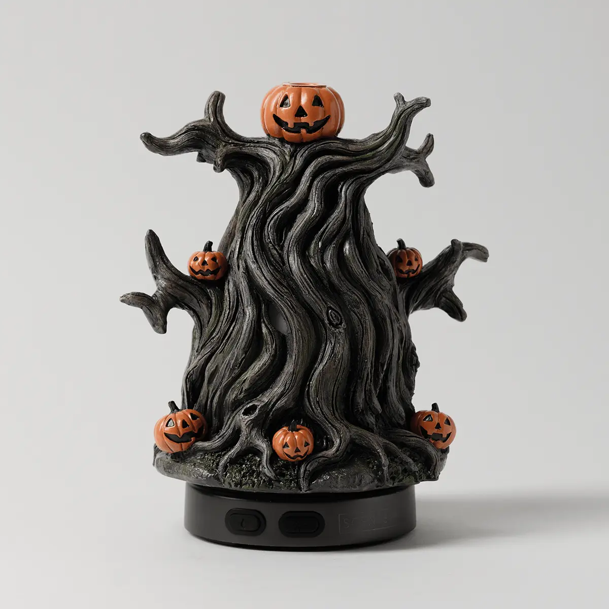 Haunted tree-shaped diffuser with gnarled black branches, orange jack-o'-lantern accents throughout, and a black base, the Midnight Jack Scentsy Diffuser