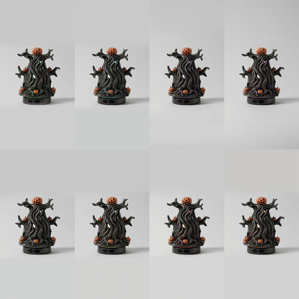 Black sculptural diffuser featuring a gnarled tree trunk with outstretched branches, a jack-o'-lantern head, and orange pumpkin accents, the Midnight Jack - Scentsy Diffuser
