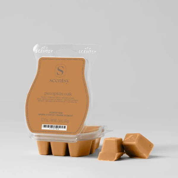 Tan Scentsy Bar wax mould with six segmented cubes and product label showing Pumpkin Oak scent name, displayed with three individual wax pieces beside the packaging, the Pumpkin Oak Scentsy Bar