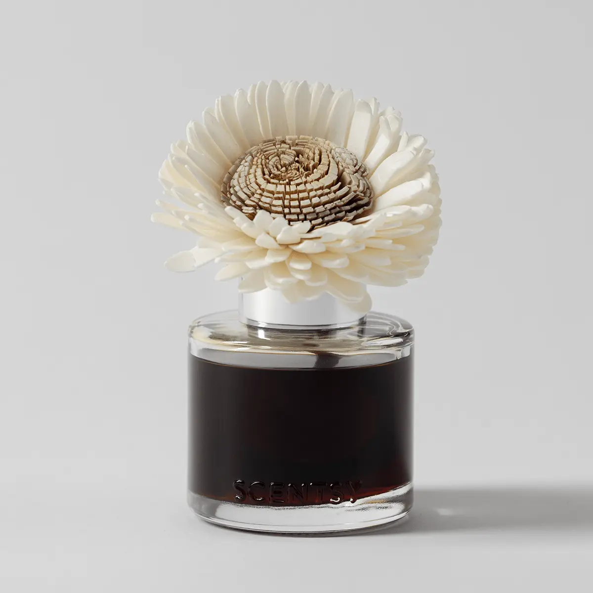 Cream and tan fabric sunflower with layered petals and textured centre, seated in a black liquid-filled glass vessel, the Pumpkin Oak - Stunning Sunflower Fragrance Flower