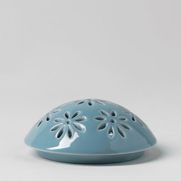 Glossy blue ceramic dome with cut-out daisy flower shapes, the Easter Garden - Blue Replacement Lid for a Scentsy Warmer