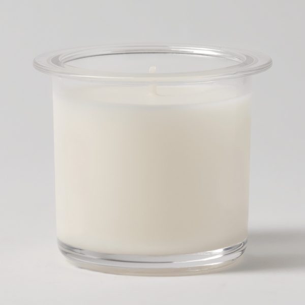 Cream wax candle insert in a clear glass vessel with a flared rim and cotton wick, the Gingerbread Hugs Candle Insert