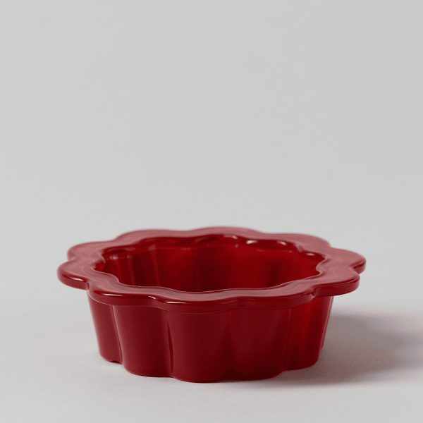 Glossy red ceramic dish with a scalloped, flower-shaped rim and fluted sides, the Petal Red Replacement Dish for a Scentsy Warmer