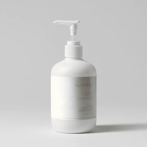 White matte pump bottle with a soft white label and delicate floral line art on a pale grey backdrop, the Pink Coconut Hand Soap