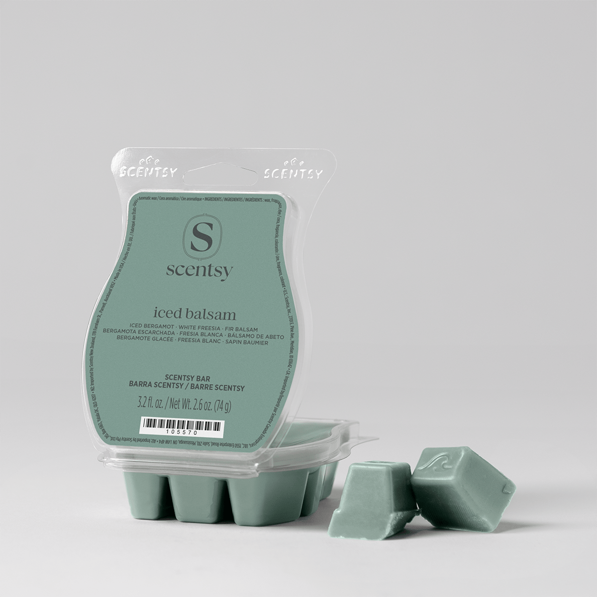 Green wax bar in a clear clamshell with a matching label and two loose cubes beside it, the Iced Balsam Scentsy Bar from the Alpine Holiday 5-pack