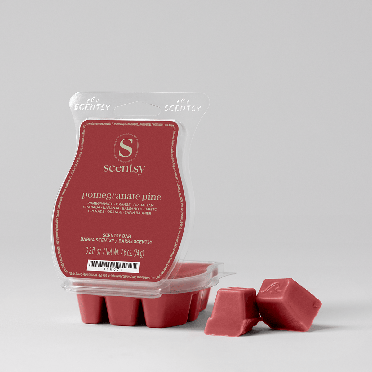 Red wax bar in a clear Scentsy clamshell with a red label, two loose cubes beside it, the Pomegranate Pine Scentsy Bar from the Alpine Holiday 5-pack
